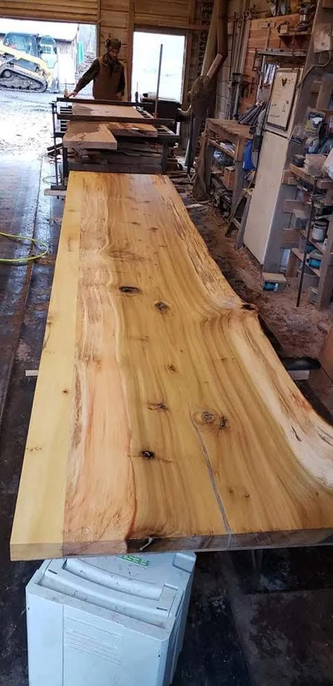 Freshly milled wood slab inside workshop